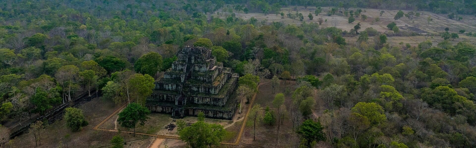 Panoramic Preah Vihear temple landscape in Cambodia on a Preah Vihear Travel banner by Legend Travel Group.
